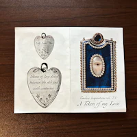 a card with a picture of a heart and a necklace