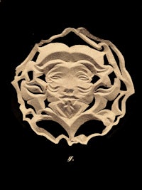 a paper cut out of a man's face