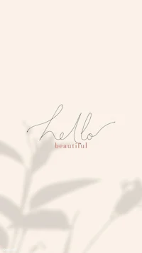 a handwritten hello on a beige background