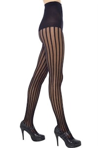 a woman wearing black striped tights and high heels
