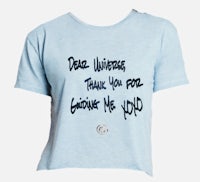 a blue t - shirt that says,'dark universes thank you for giving me a hug'