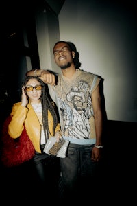 a man and a woman standing next to each other