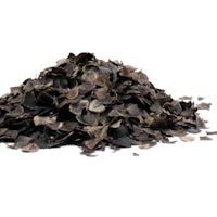 a pile of dried leaves on a white background