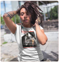 a woman with dreadlocks wearing a white t - shirt