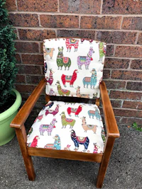 a chair with a colorful llama print