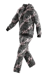 a woman is walking in a leopard print pajama set