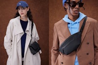 a man and a woman in a trench coat and a fanny pack