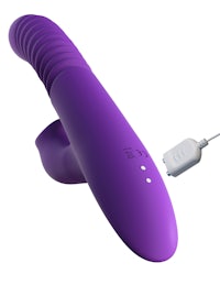 a purple sex toy with a cord attached to it