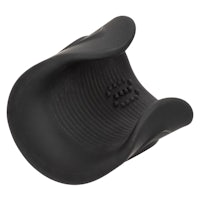 a black plastic seat cushion on a white background