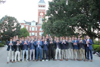 a group of men posing for a picture