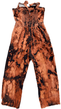 a black and orange tie dye jumpsuit