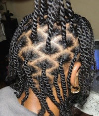 the back of a woman's hair with twists in it
