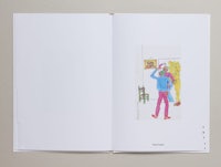 an open book with a picture of a woman and a man