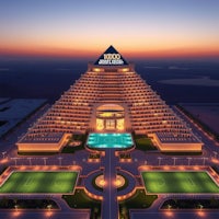 an image of a pyramid at dusk