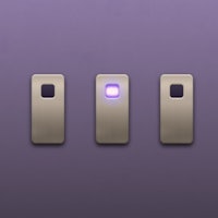 three light switches on a purple background