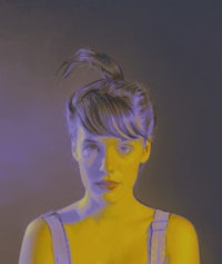 a woman is posing for a photo