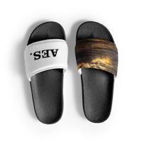 a pair of slide sandals with the word vez on them
