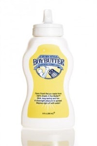 a bottle of boy butter on a white background