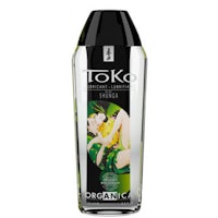 a bottle of toko organic body wash with an image of an asian woman