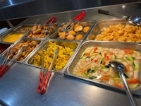 a buffet with a variety of food on it