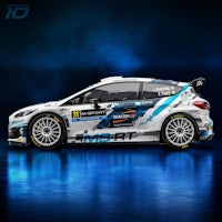 a ford fiesta rally car in a blue background