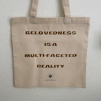 believability is a multi-faced reality tote bag