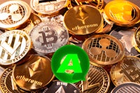 a group of coins with the letter a in the middle
