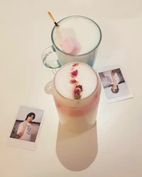 a cup of coffee with a photo of a girl and a cup of ice cream