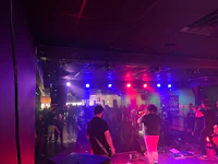 a group of people on stage at a concert