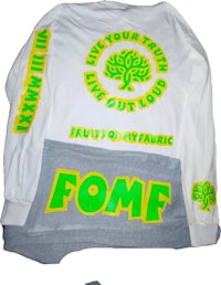 a white long sleeve shirt with a green tree on it