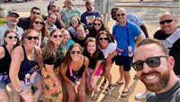 a group of people posing for a selfie