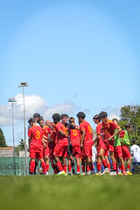 a group of soccer players on a field