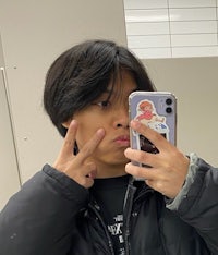 a person taking a selfie in a bathroom
