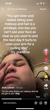 a woman's face is shown on a phone screen