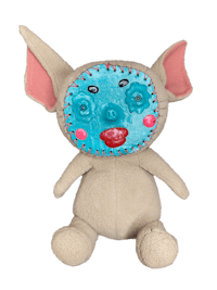 a stuffed animal with blue eyes and a blue nose