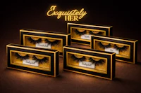 lashes in gold boxes with the words'exquisitely her'