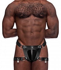 a man wearing a black leather harness
