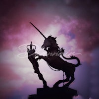 a statue of a unicorn on top of a cloudy sky