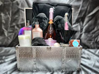 a silver box with a bottle of champagne and other items