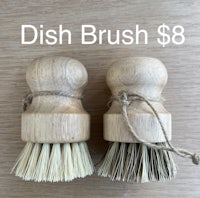 two wooden dish brushes with the words dish brush $ 8