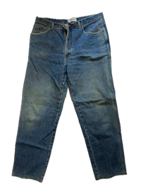 a pair of blue jeans on a black background