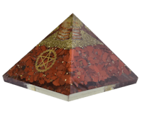 a pyramid with red stones and a pentagram on it