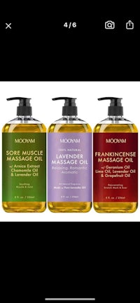 three bottles of shampoo, conditioner, and body wash
