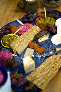 a blue tray with a variety of foods on it