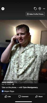 a man on a cell phone is talking on the phone