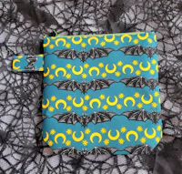 a bag with bats and moons on it