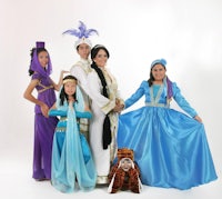 a group of people dressed up in egyptian costumes