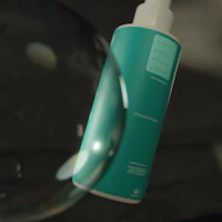 a bottle of soap with bubbles in it