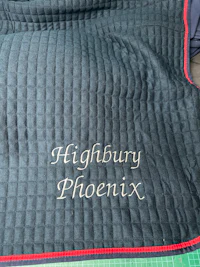 a quilted blanket with the word phoenix on it