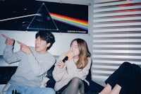 a man and a woman sitting on a couch